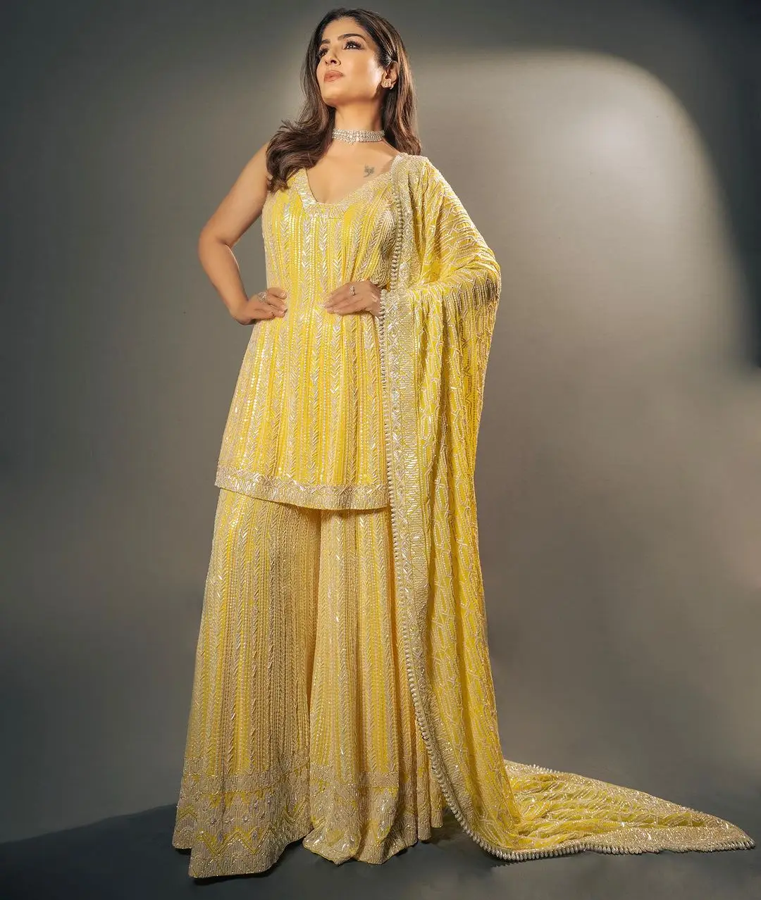 Raveena Tandon Wearing Beautiful Earring Yellow Gown